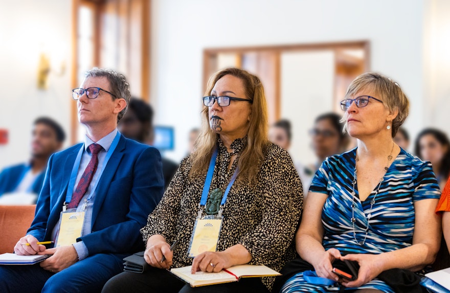 Participants listening intently to the keynote address.