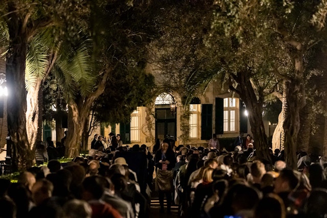 Participants assembled in the courtyard of the Haifa Pilgrim House moments before the start of the program.