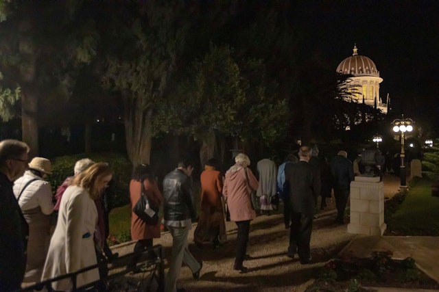 Participants circumambulating the Shrine of the Báb.