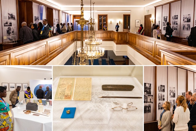 Attendees visiting an exhibit about ‘Abdu’l-Bahá’s contributions to the development of the Bahá’í community and His service to society. The exhibit also contained artefacts associated with His life.