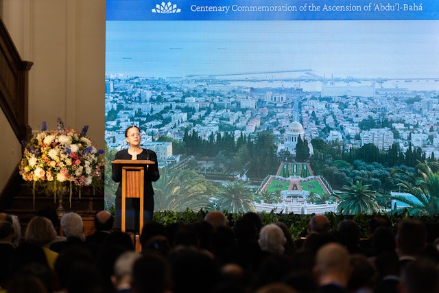A member of the International Teaching Centre, Holly Woodard, delivering an address to the gathering. Dr. Woodard spoke about the development of the global Bahá’í community in recent decades.