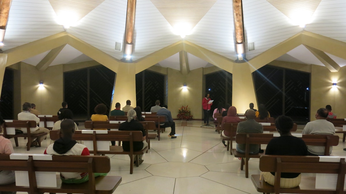 An interior view of temple during the devotional program of the evening.