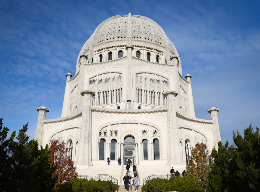 An exterior view of the House of Worship in Wilmette, United States, as attendees arrive for the daytime commemoration program.