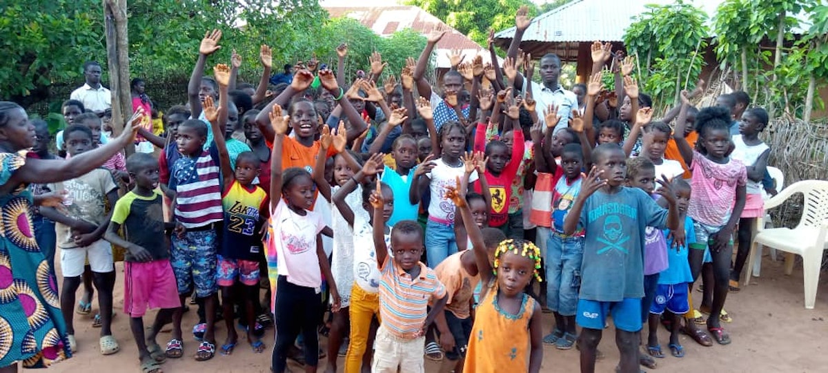 Children and youth at a gathering honoring the centenary held in Guinea-Bissau.