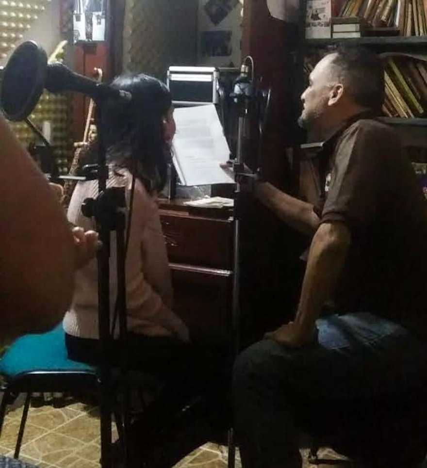 Seen here is the airing of a radio program in Venezuela about the personage of ‘Abdu’l-Bahá.