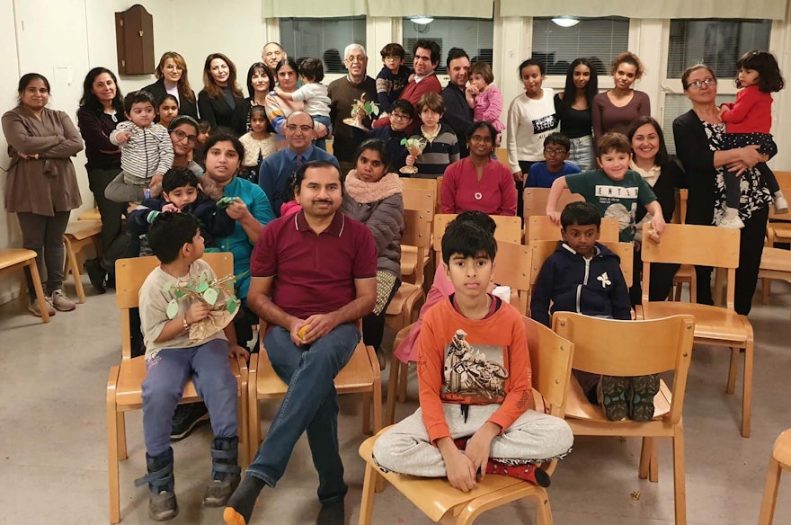 People of all ages and backgrounds gathered at a commemoration event in Sweden. The program included music sung by children, devotions in different languages, art activities on the theme of generosity, and a screening of Exemplar.