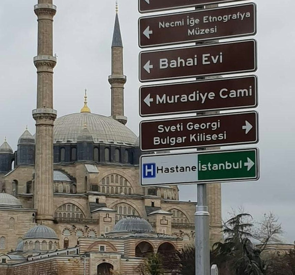 A number of signs labelled “Bahá’í House” mark the location of a house in Edirne where Bahá’u’lláh, ‘Abdu’l-Bahá, and their families lived as exiles.