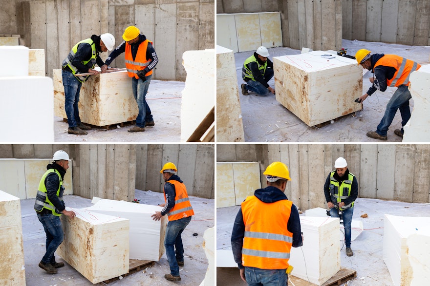 Seen here are blocks of EPS being cut to be placed in the planters.