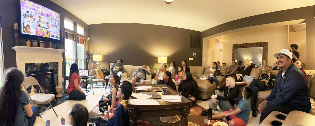 Seen here are friends and neighbors of all ages at a gathering held in a home in San Diego, United States, as part of the series of conferences being held in that city.