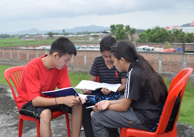 Seen here are participants of Bahá’í educational programs that build capacities in children and youth to apply principles such as the essential oneness of humanity, service to society, equality of women and men, and consultation in all their interactions with the members of their immediate and extended families, as well as other people with whom they socialize in their neighborhoods and schools.