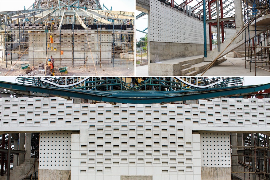 This image shows the latest work on the outer walls, which feature breeze blocks that allow for efficient ventilation.
