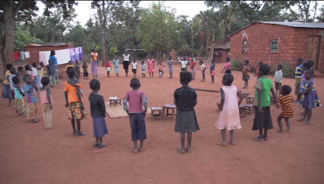 Children in Mwinilunga, Zambia, gather for moral education classes.