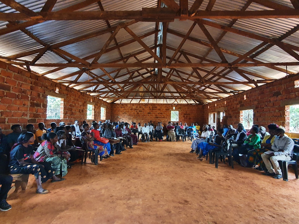 A gathering in the Katuyola community in Mwinilunga, Zambia.