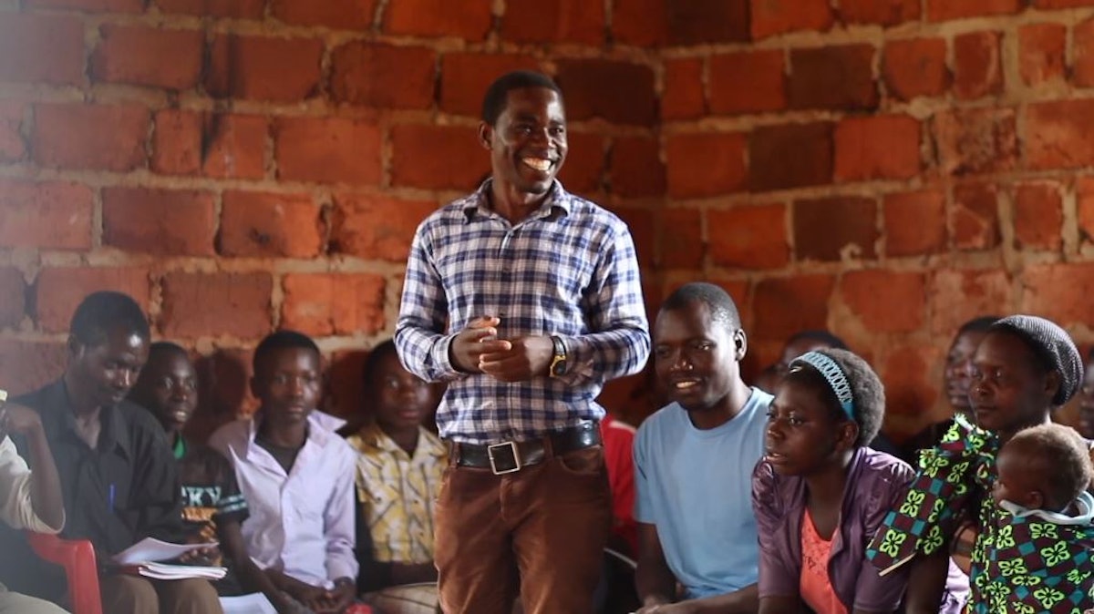 Youth in Mwinilunga, Zambia, consult about their future and how they can contribute to the material and spiritual prosperity of their community.