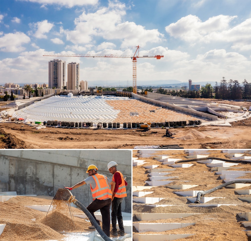 Workers pour gravel onto the EPS formwork, leveling the slope and preparing it for concrete to be poured.