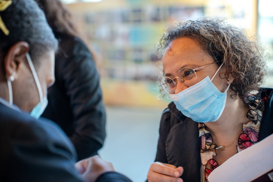 A participant at the registration desk.