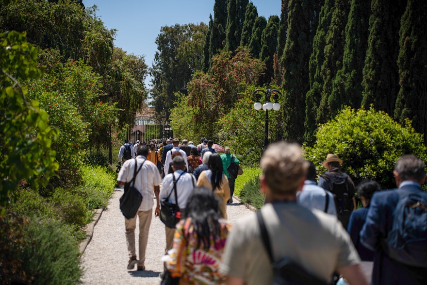 Delegates approach the Shrine of Bahá'u'lláh during their visit to Báhjí.