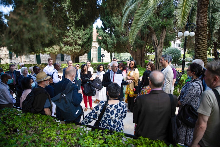 Delegates gather before their visit to the Shrine of the Báb.