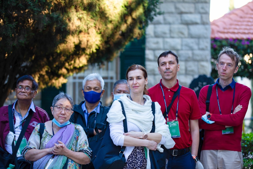 Delegates near the Shrine of the Báb.