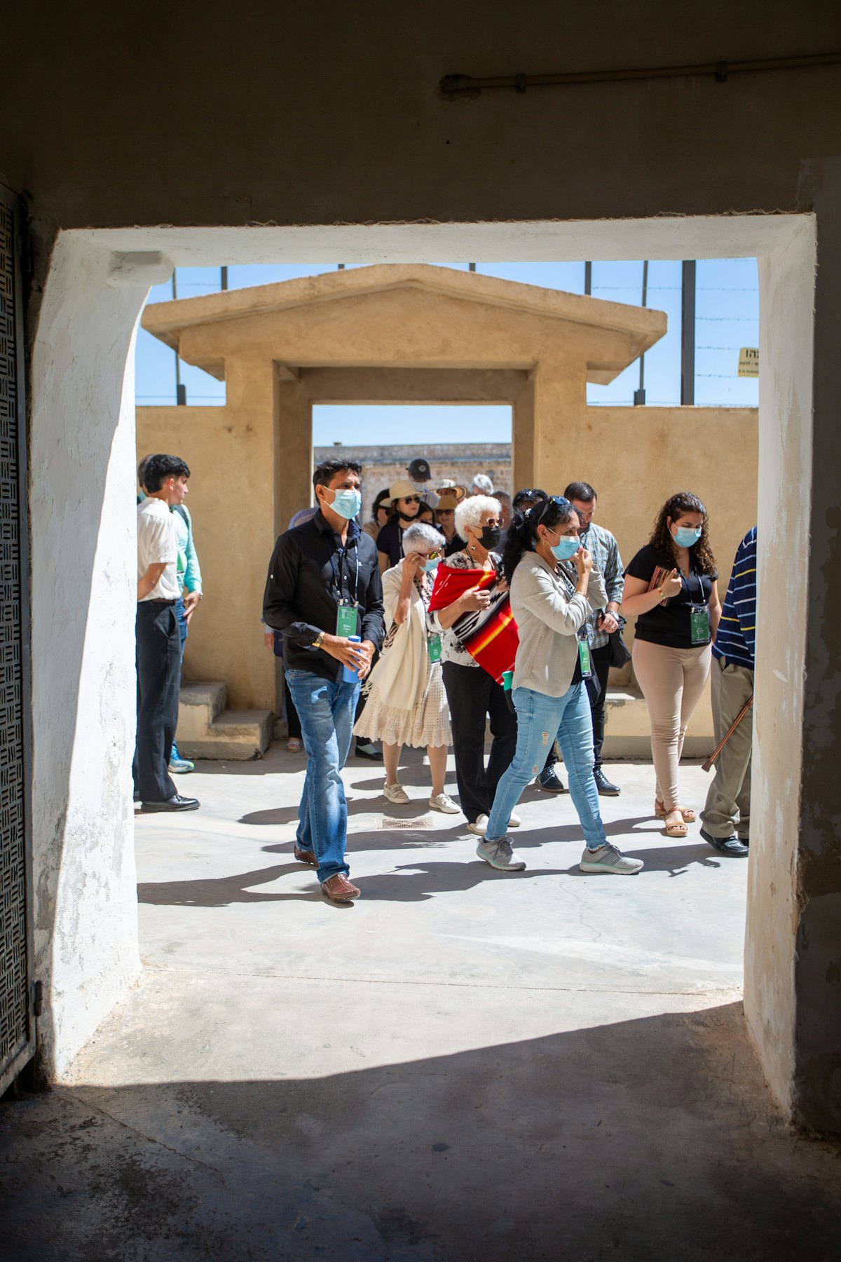 As seen from the citadel entrance, a group begins its visit to the Cell.