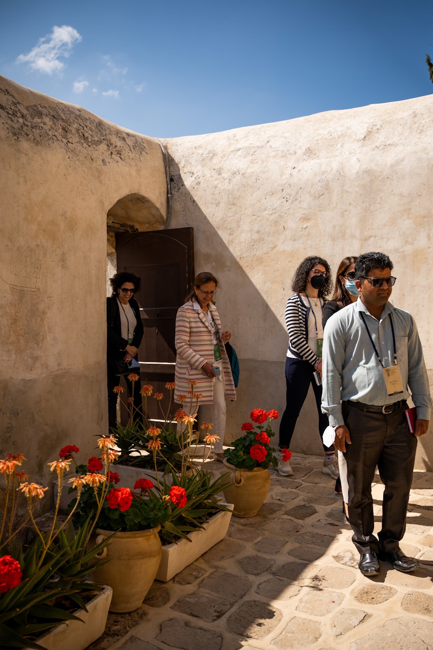 Delegates enter the Mansion of Mazra‘ih.