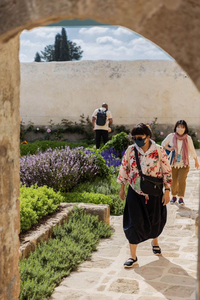 Delegates from Taiwan walk in the gardens of the Mansion of Mazra‘ih.