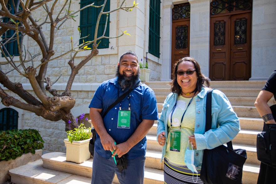 Delegates from the Caroline Islands in front of the House of ʻAbdu'l-Bahá.