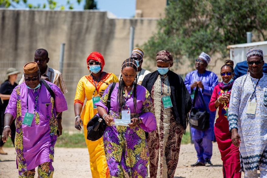 Delegates from West Africa at the construction site for the Shrine of ʻAbdu'l-Bahá.