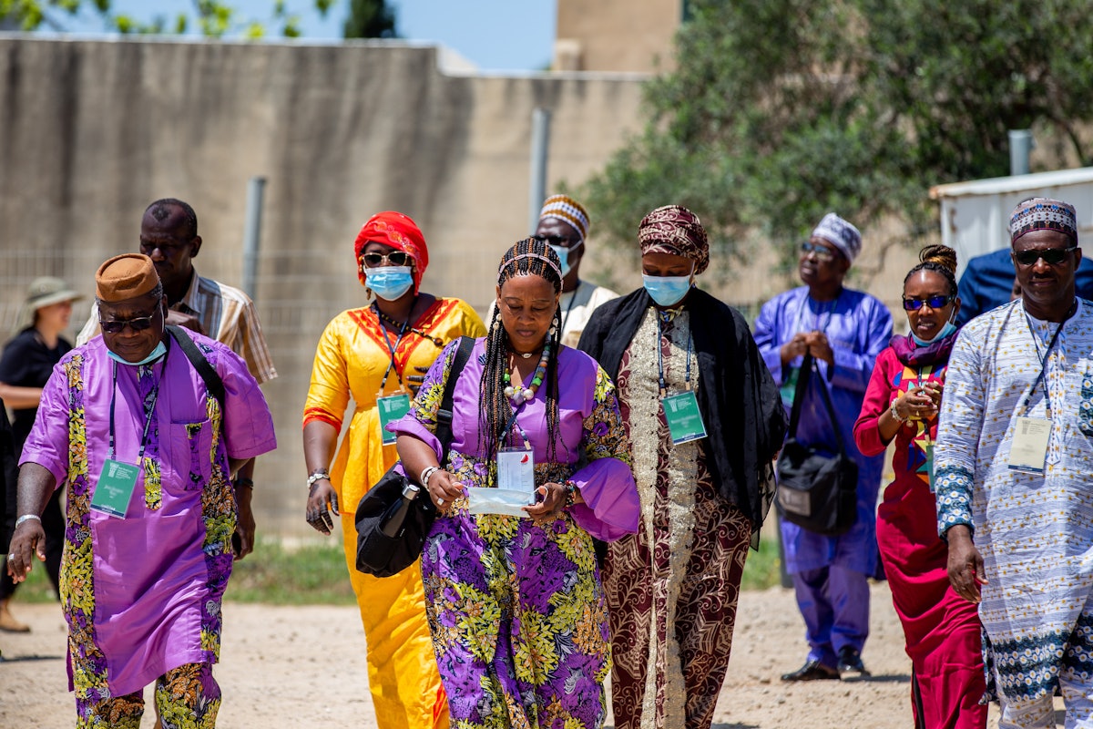 Delegates from West Africa at the construction site for the Shrine of ʻAbdu'l-Bahá.