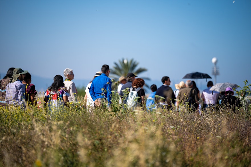 Delegates during their visit to the construction site of the Shrine of ʻAbdu'l-Bahá.