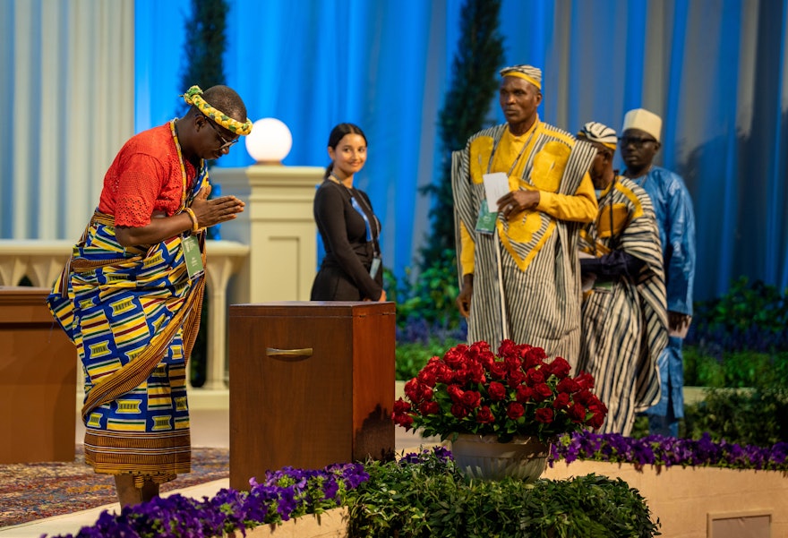 A delegate from Côte d’Ivoire casts his ballot for the election of the Universal House of Justice.