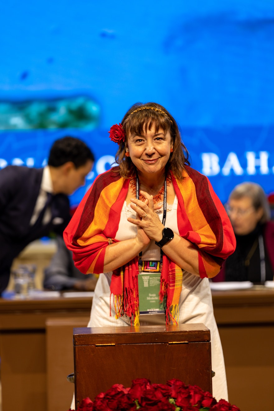 A delegate from Croatia casts her ballot for the election of the Universal House of Justice.