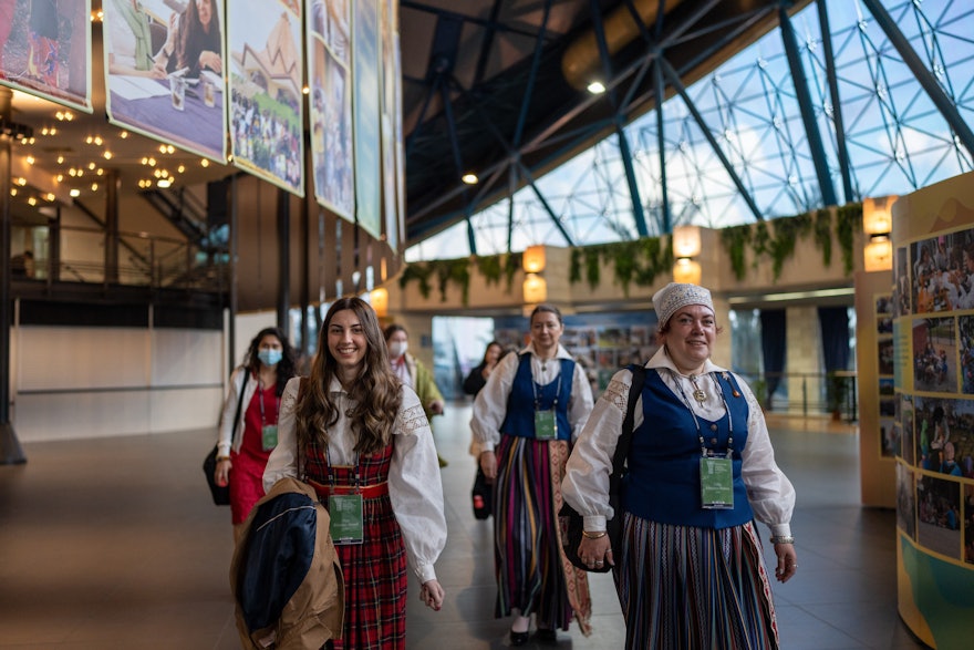 Delegates from Latvia arriving for the opening session of the 13th International Bahá’í Convention.