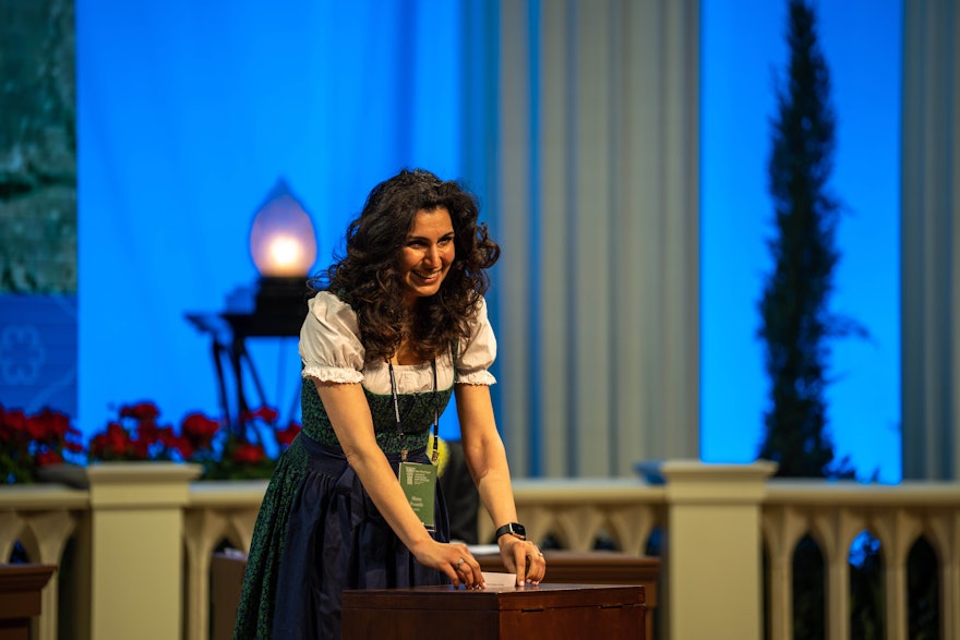 A delegate from Austria casts her ballot for the election of the Universal House of Justice.