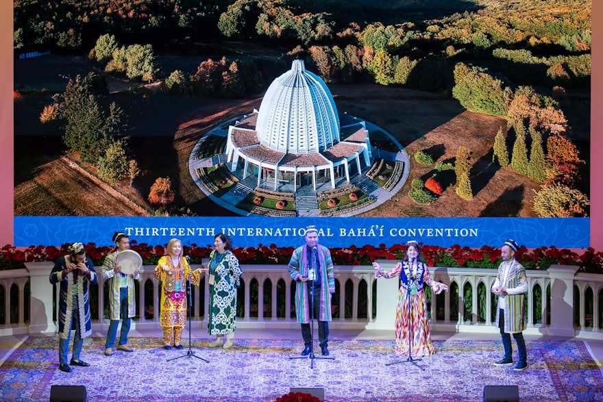 Participants from Tajikistan during a musical presentation at the 13th International Bahá’í Convention.