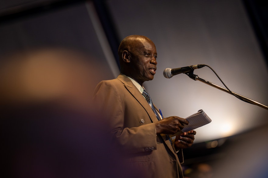 A delegate from Uganda addresses the Convention during a consultative session.