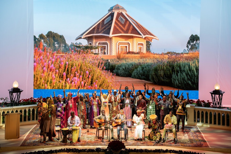 Delegates from countries throughout Africa perform a lively musical presentation at the 13th International Bahá’í Convention.