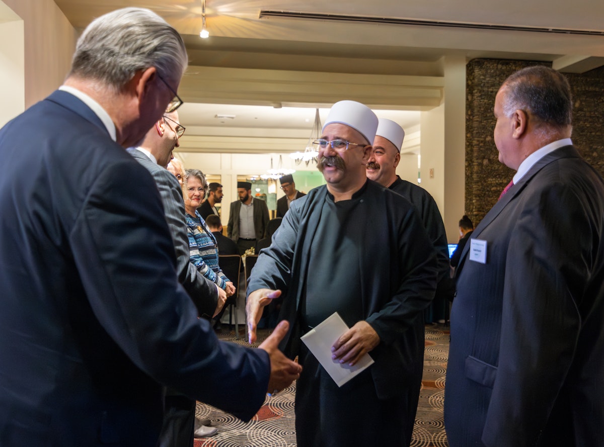 David Freeman (left), a representative for the Bahá’í International Community, and leaders from the Druze religious community (middle).