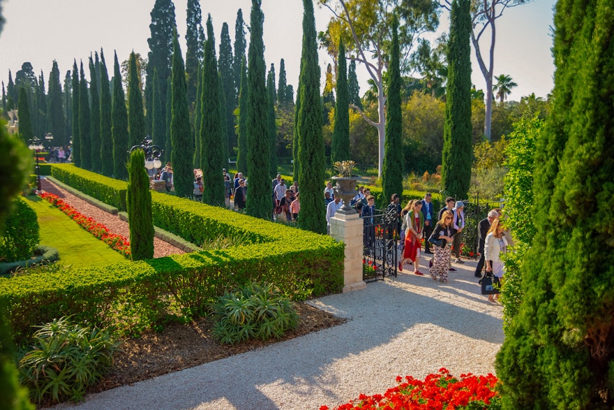 Following a devotional program, guests circumambulate the Shrine of Baháʼu’lláh.