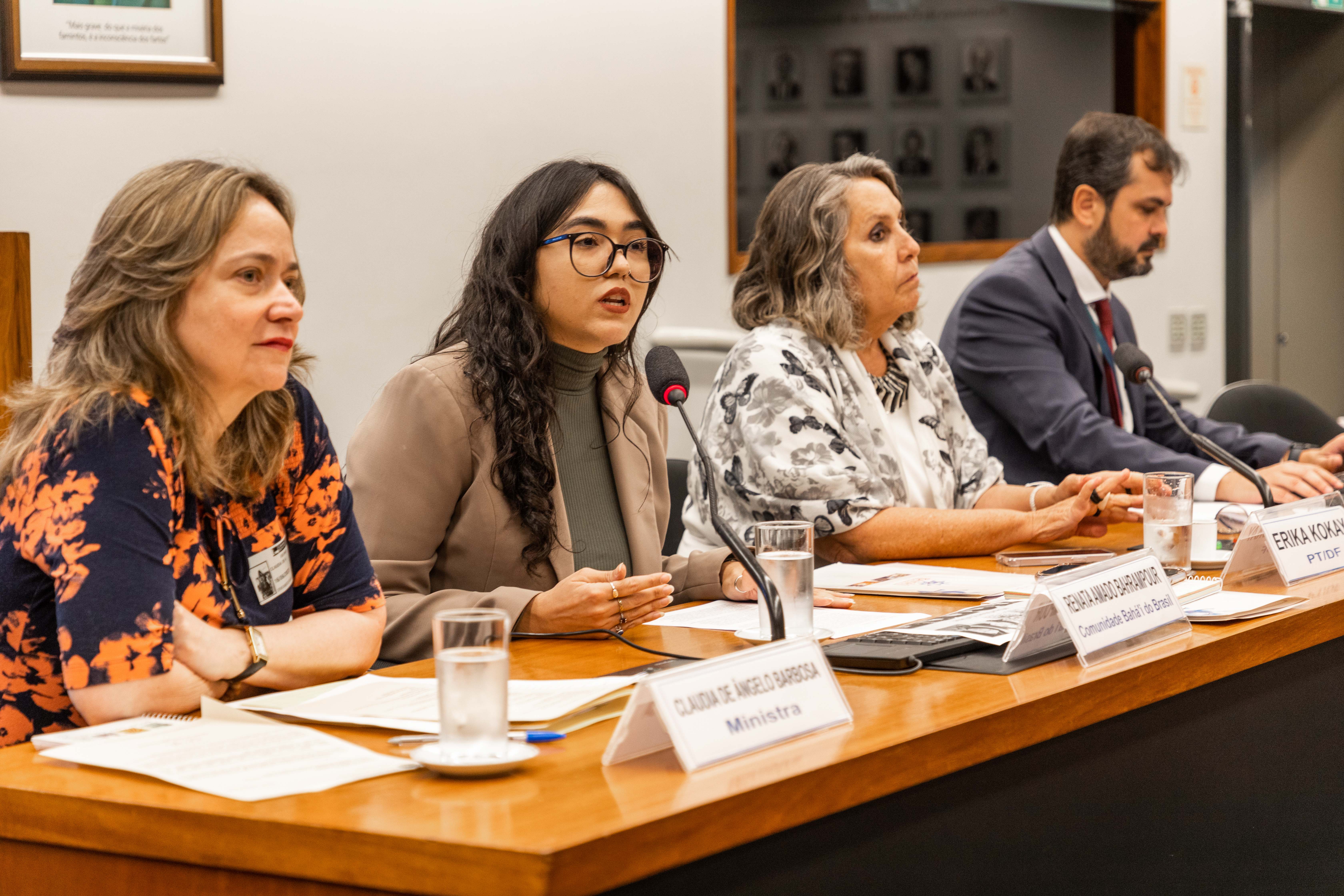 Left to right: Minister Claudia de Ângelo Barbosa, Director of the Department of Human Rights and Social Affairs at the Ministry of Foreign Affairs; Renata Bahrampour, representative of the Bahá’í community of Brazil; Federal Deputy Erika Kokay of the lower house of Congress; and Vitor Côrtes Magalhães, Executive Secretary for the Commission of Participatory Legislation.