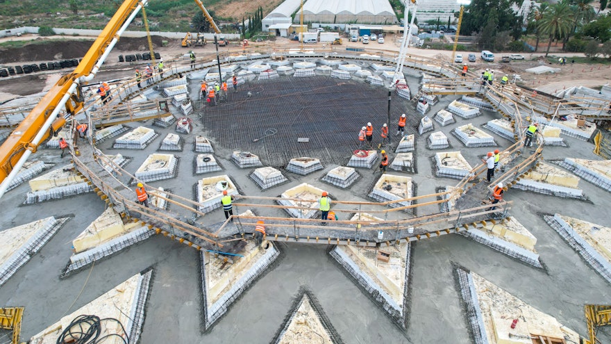 As morning wears on, the center of the roof structure is the only section remaining to be poured.