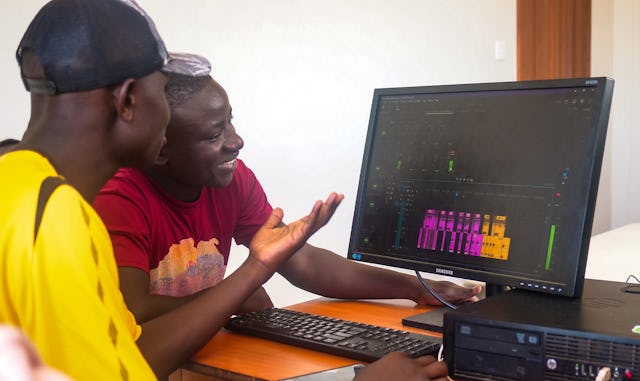 Members of the Radio Jamii team record and edit one of their programs.