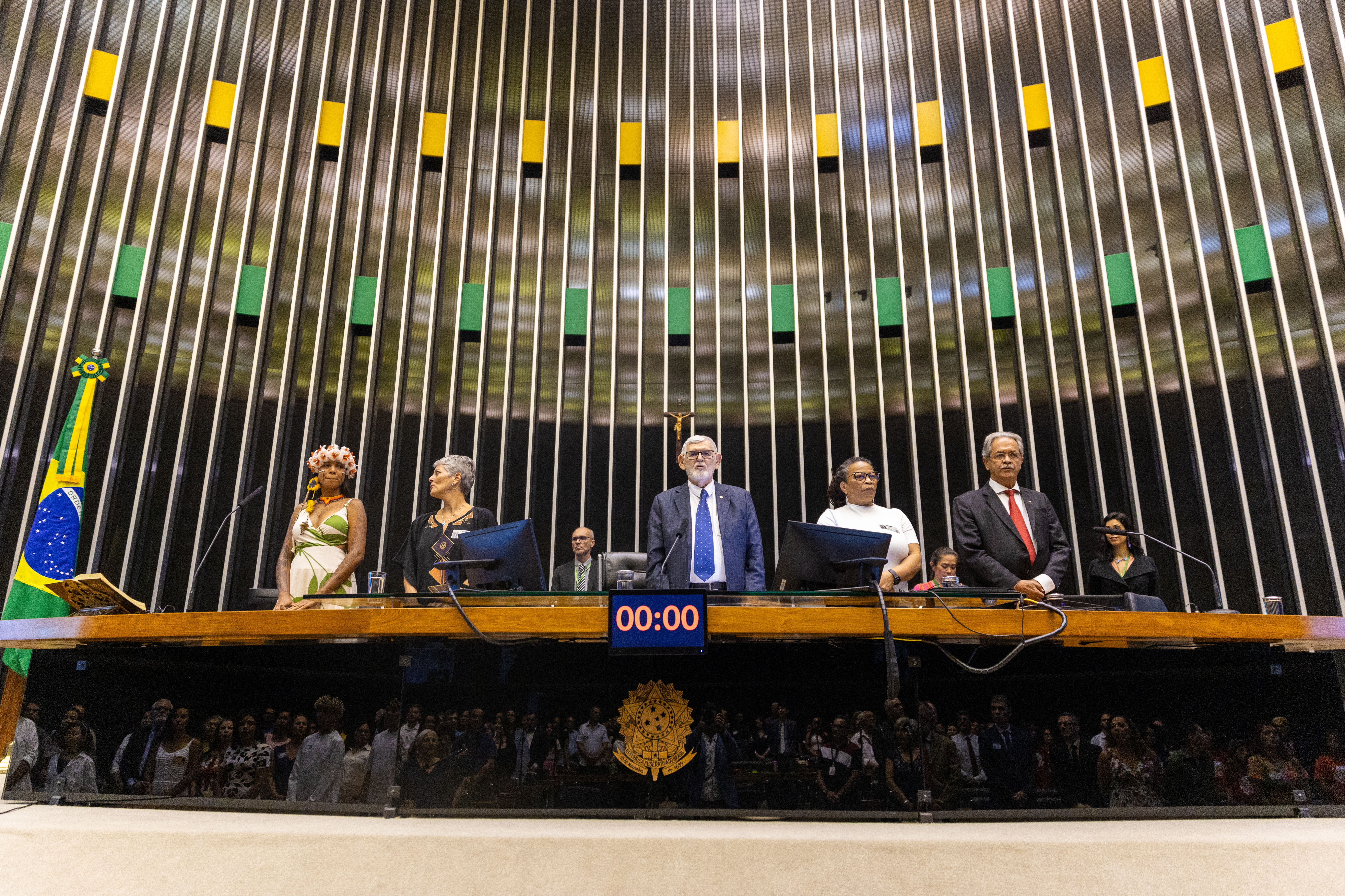 Left to right: Nayrí Cruz, representing an indigenous community; Liese von Czékus Cavalcanti, of the Bahá’í National Spiritual Assembly of Brazil; Deputy Luiz Couto; Lúcia Xavier, member of a civil society organization; Nilmário de Miranda, an official in the Ministry of Human Rights and of Citizenship.
