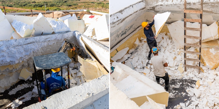 The formwork is chipped away to reveal the concrete structure.