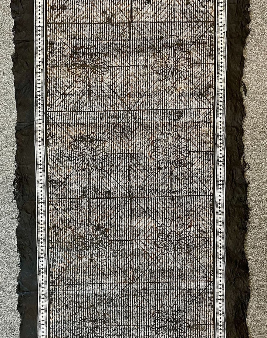 Titled “FA’UTAHA,” Tongan for unity, this piece embodies the spirit of solidarity as women come together.