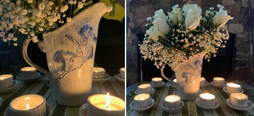 A ceramic vase surrounded by 10 candles honoring the 10 Bahá’í women of Shiraz who chose their faith and principles of oneness, equality, and justice over life itself.