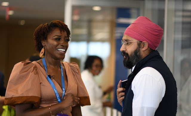 Two contributors of the volume at the launch event.