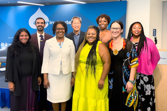 A group photo of some contributors to the collection of essays at the launch event.