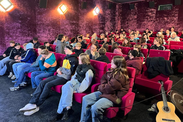 The film screening at a local cinema.