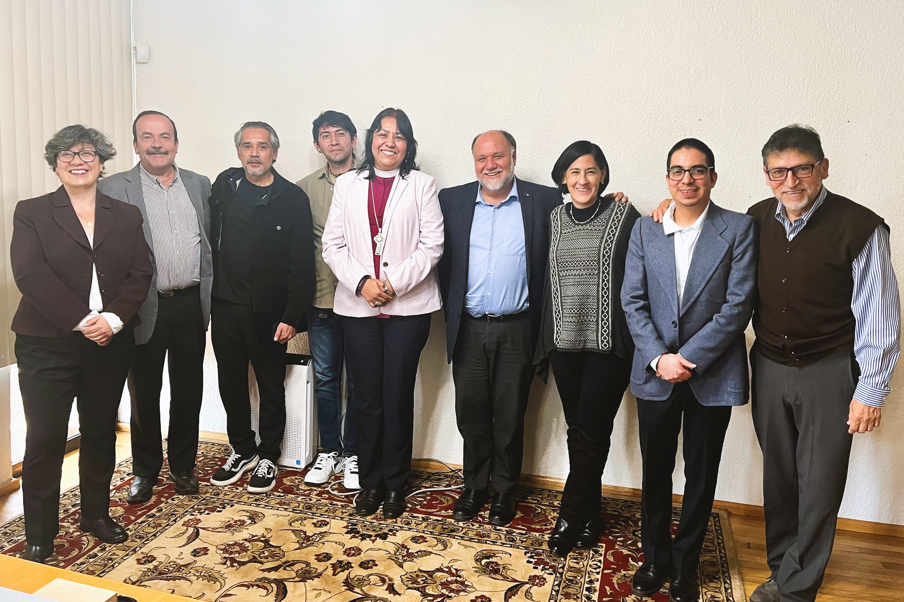 A group photo of the roundtable participants at the Bahá’í National Centre in Mexico City. Left to right: Gabriela Amores, a criminal lawyer specializing in femicide cases and a member of the Mexican Federation of University Women (FEMU); Ignacio Cuevas, professor at the Ibero-American University and the Cloister of Sor Juana; Angello Baños, sociologist and workshop facilitator at the General Directorate for Well-being and Social Cohesion; Miguel Alejandro Rivera, Head of International News Editing at Excélsior newspaper; Sally Sue Hernández, Bishop of the Anglican Church in Mexico City; Carlos Ceballos, head of the Theology Department at La Salle University; Jimena Esquivel, Director of the Tolerance and Religious Freedom at the General Directorate of Religious Affairs; Oscar Covarrubias and Arturo Serrano, members of the Bahá’í Office of External Affairs in Mexico.